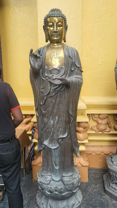 Buddha statues bears a swastika relief 